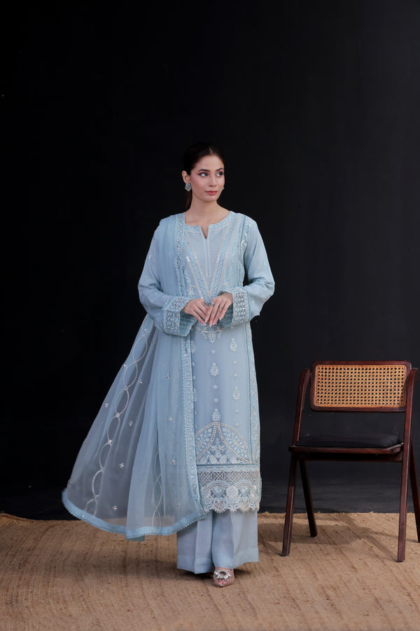 SAFFRON - Woman wearing a Grayish Light Ashy blue embroidered traditional outfit